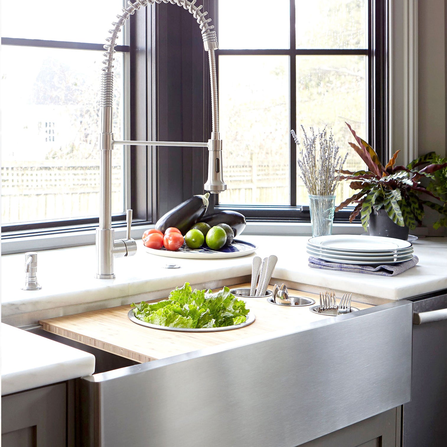 37 inch stainless steel farmhouse sink with apron front and workstation sink accessories in white marble countertop with industrial style stainless steel faucet