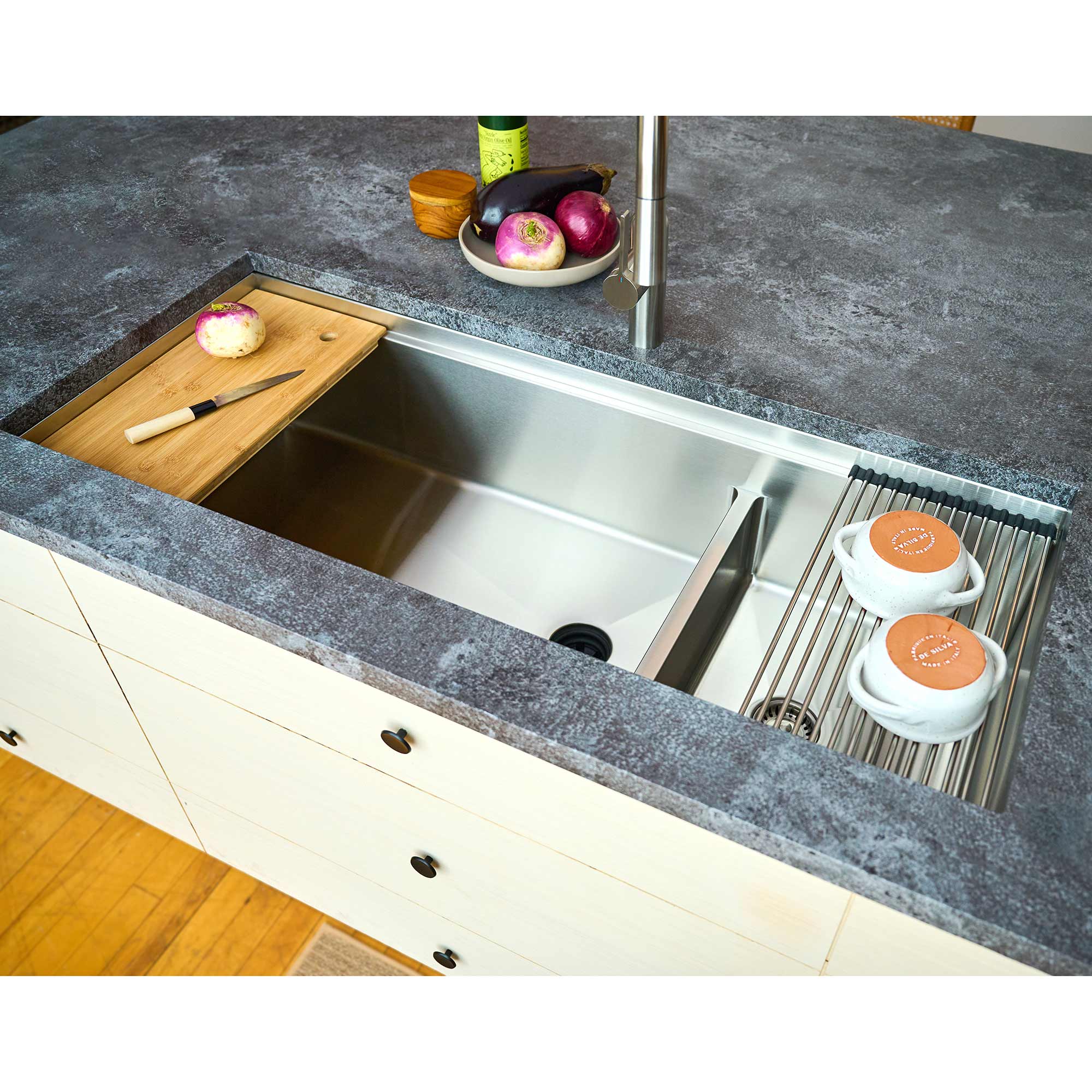 Modern kitchen setup featuring a 46-inch double bowl workstation sink with built-in accessories, ideal for multitasking and efficient meal prep.