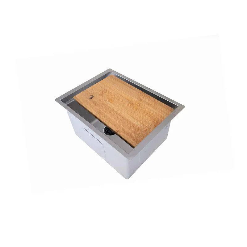 15-inch stainless steel workstation bar sink with an integral ledge and a fitted wooden cutting board. Perfect for small kitchens or prep areas.