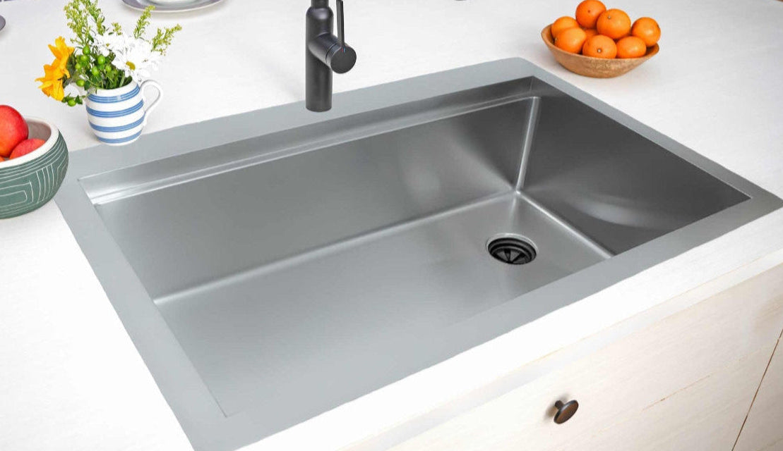 drop-in workstation sink with integral ledge for sink  accessories