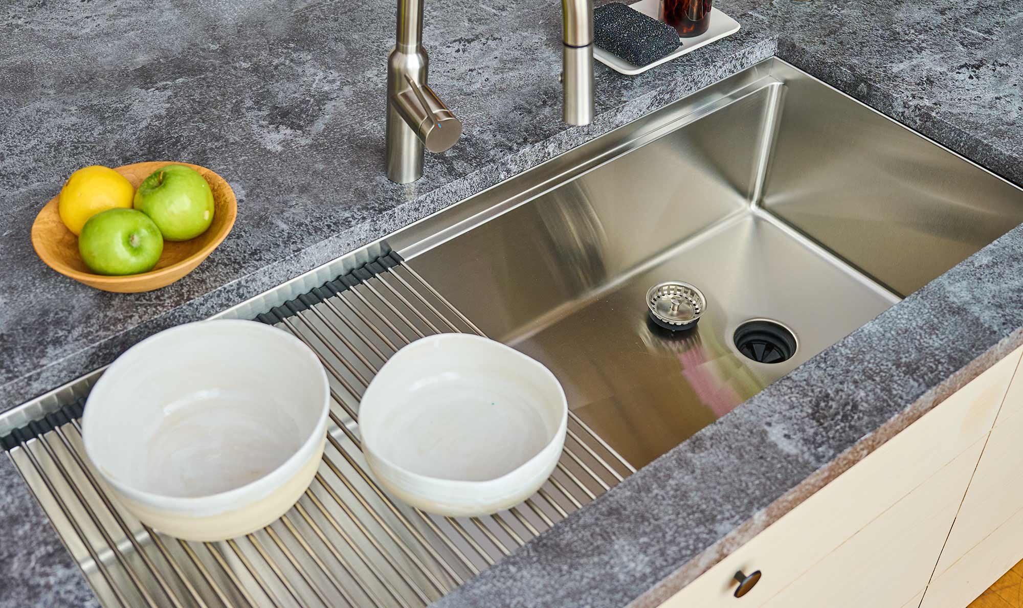 large single bowl workstation sink with offset drain. Sink is made with 16 gauge 304 stainless steel.