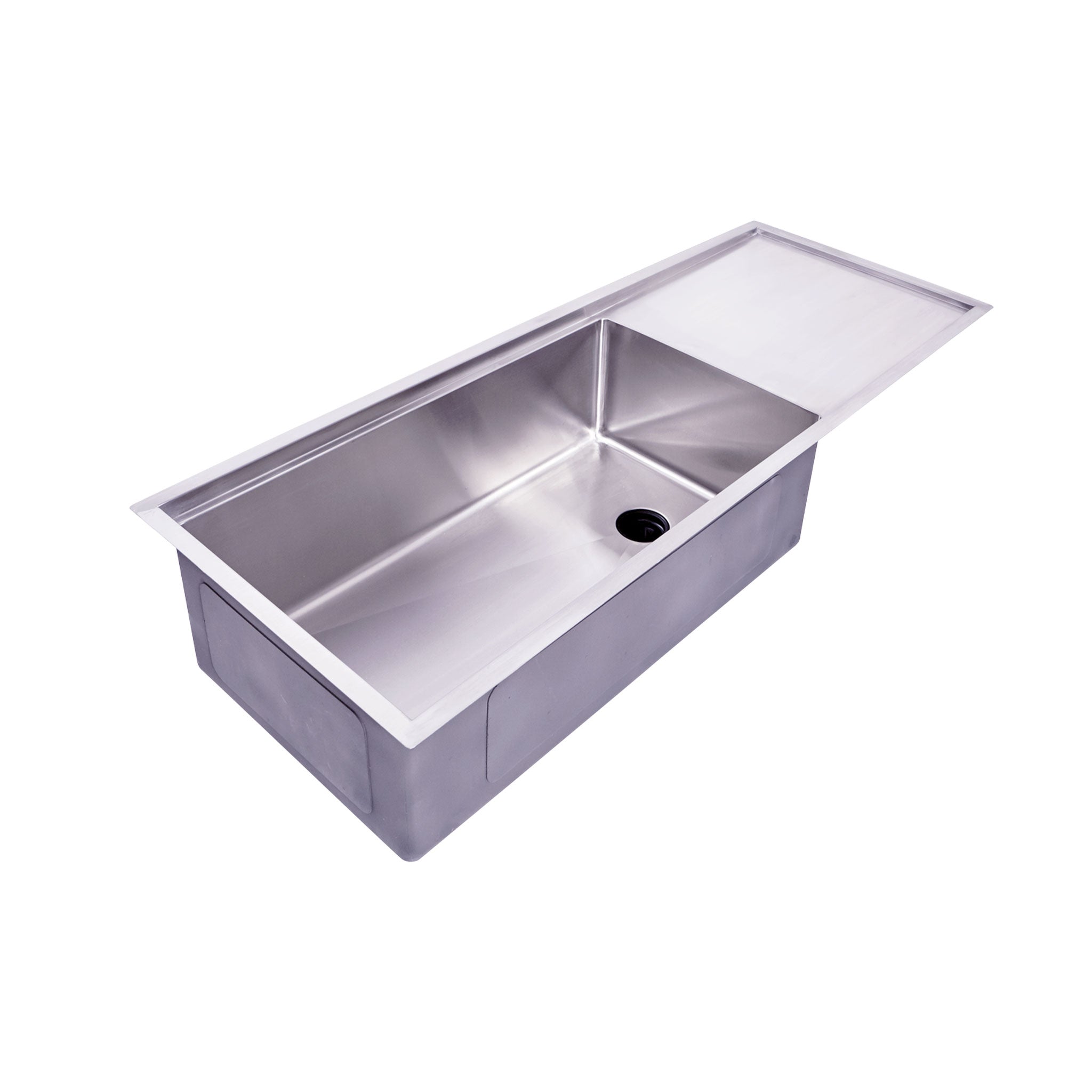 Drainboard workstation sink with reversible seamless drain