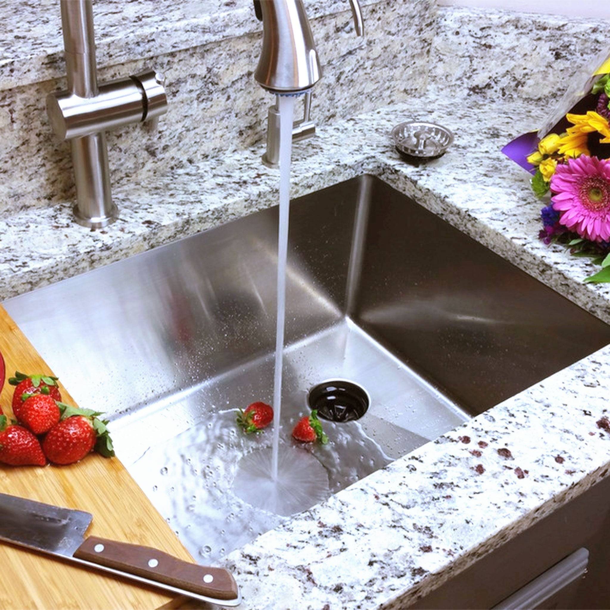 Overhead view of client submitted photo of a 33" classic style kitchen sink with a seamless drain.