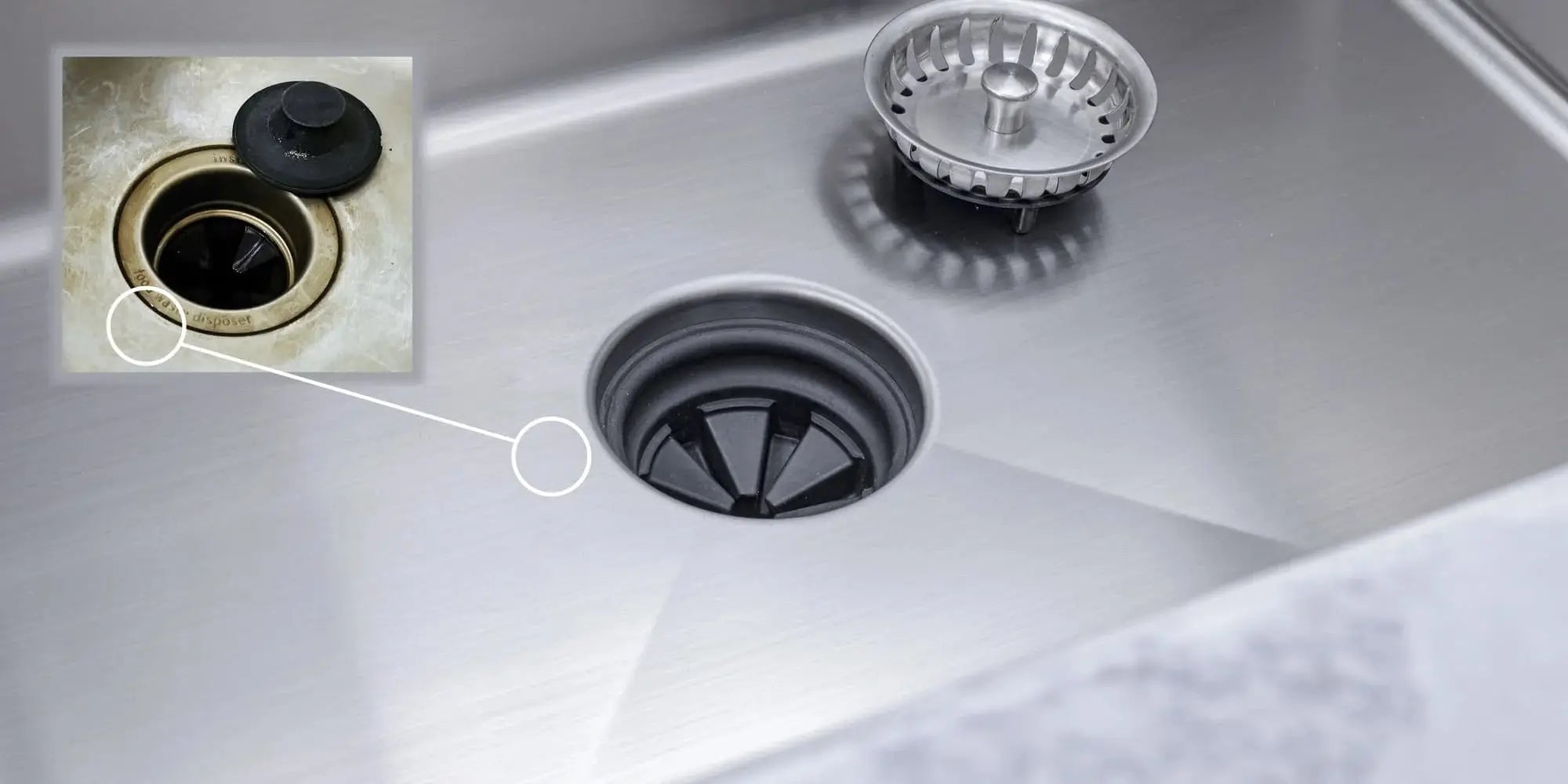 Installed splash guard in a stainless steel sink drain, preventing splashes and debris. A practical replacement part for kitchen plumbing systems.