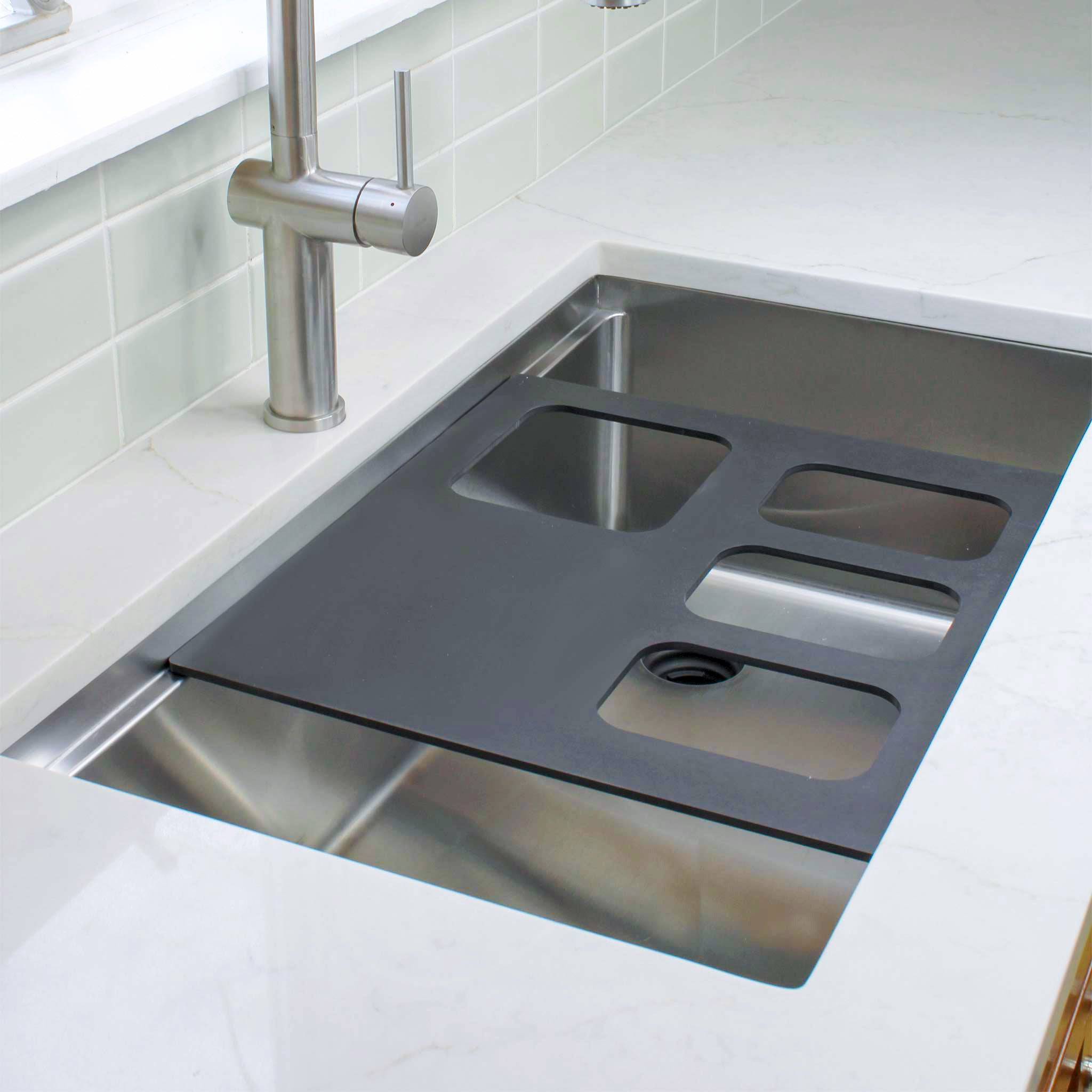 Create Good Sinks’ Black, 4 Bowl Serving Board for a Workstation Kitchen Sink.