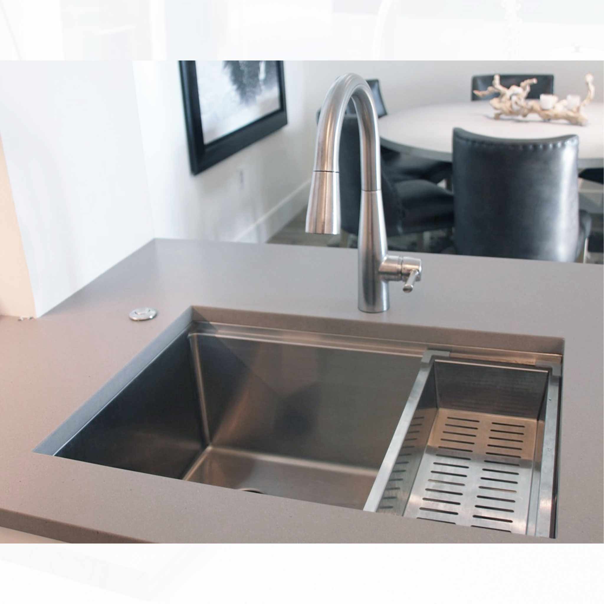 Client photo of our 26" workstation sink with offset drain left. Shown with our colander sink accessory.