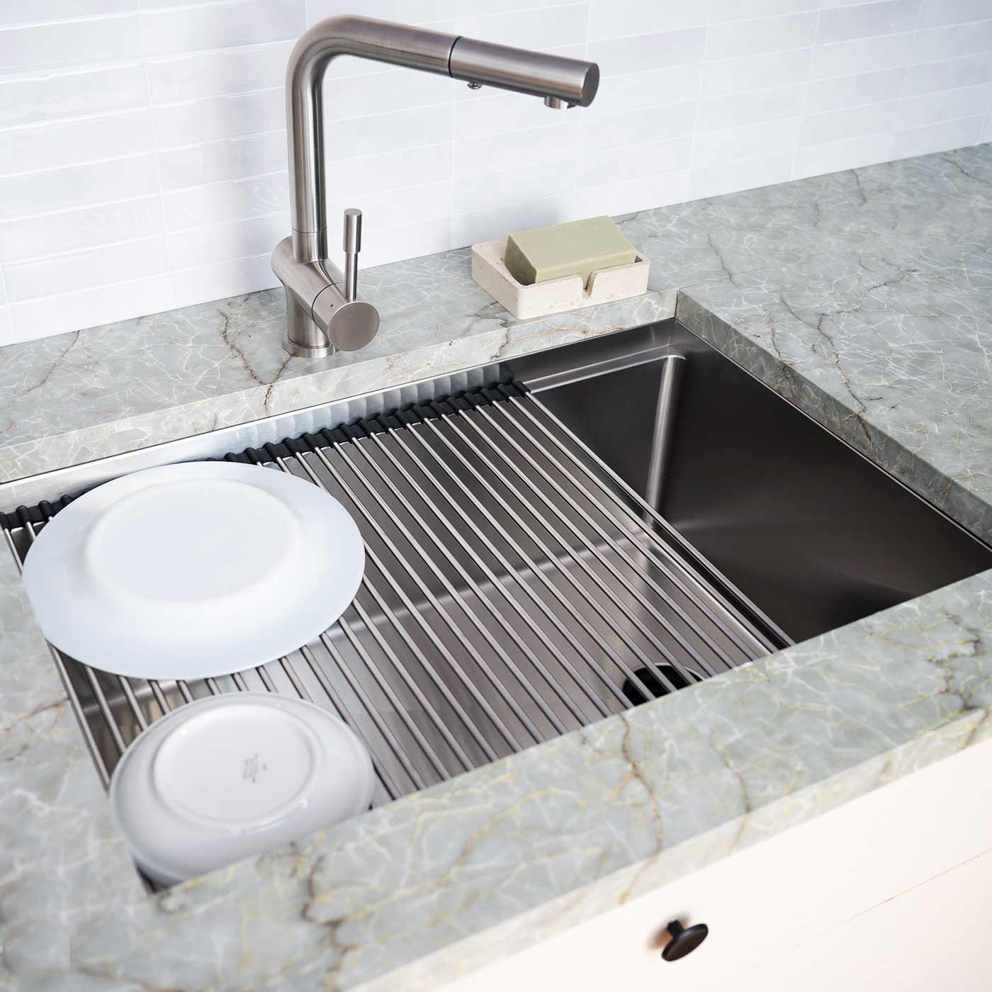 28 inch workstation sink made with 16 gauge stainless steel and offset reversible seamless drain