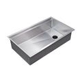 31-inch stainless steel workstation kitchen sink with an 8-inch depth and offset drain. Features a sleek undermount design with a reversible ledge.