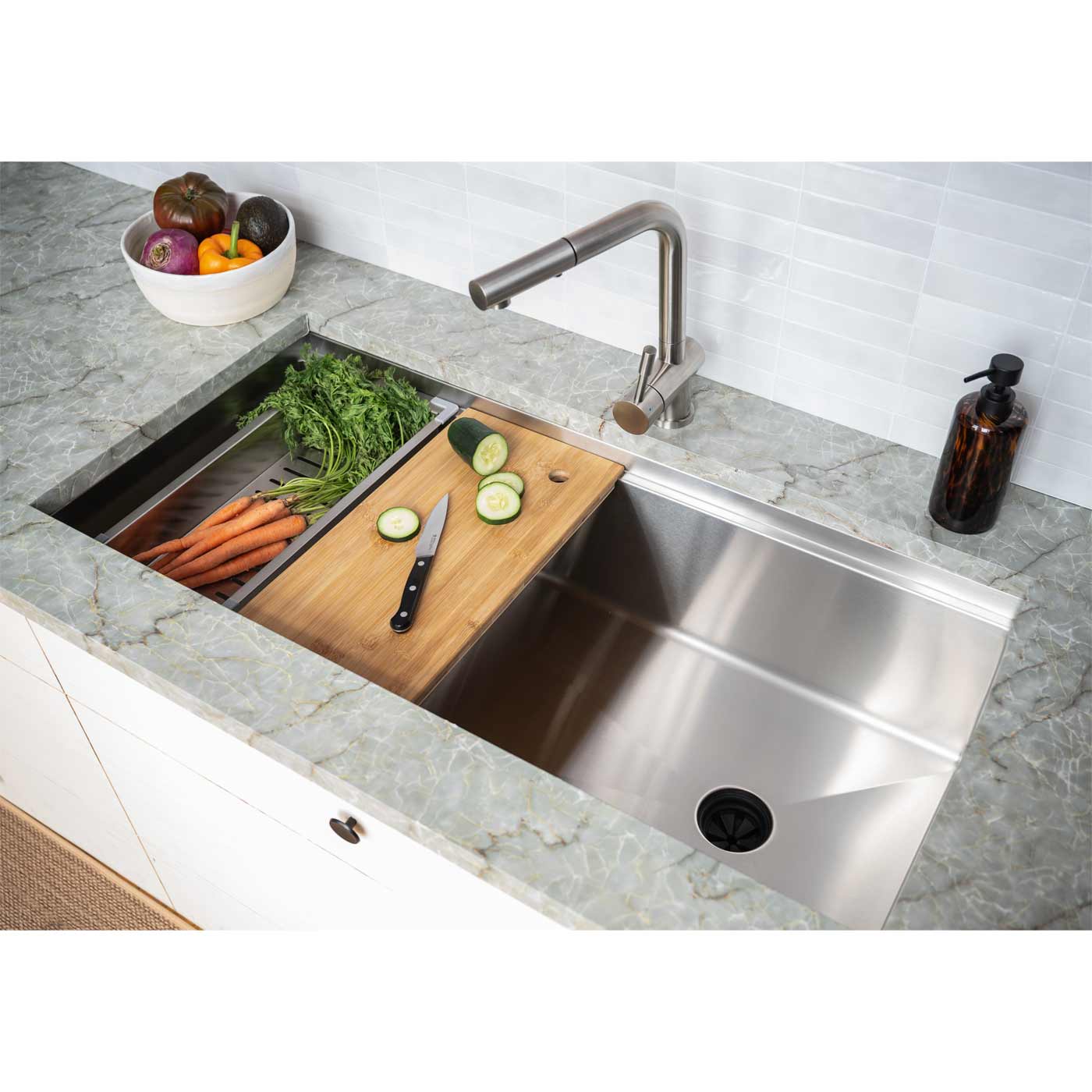 40-inch workstation kitchen sink installed with a built-in ledge, featuring a cutting board and fresh vegetables for efficient meal prep.