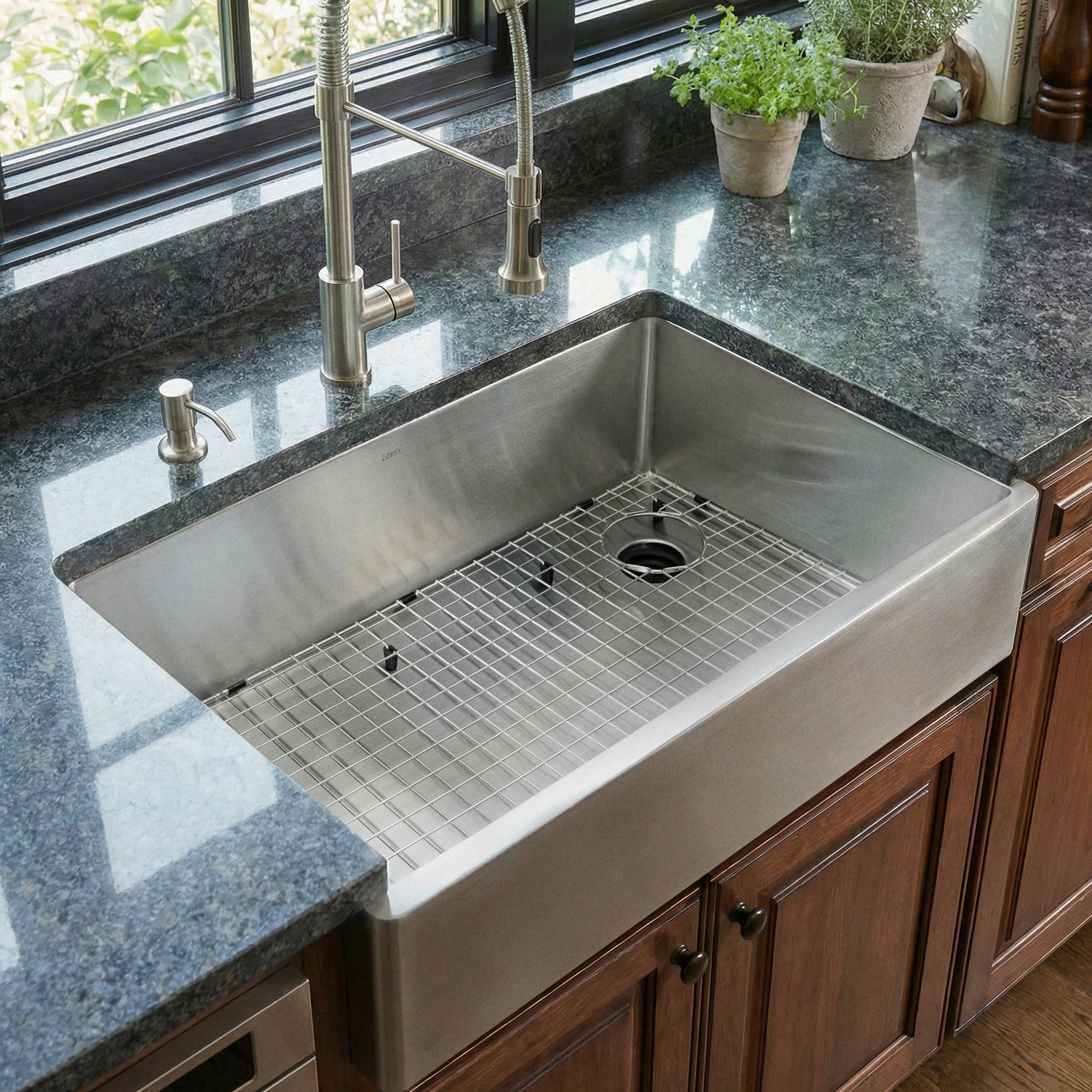 33 inch farmhouse sink with stainless steel apron front installed in traditional style kitchen