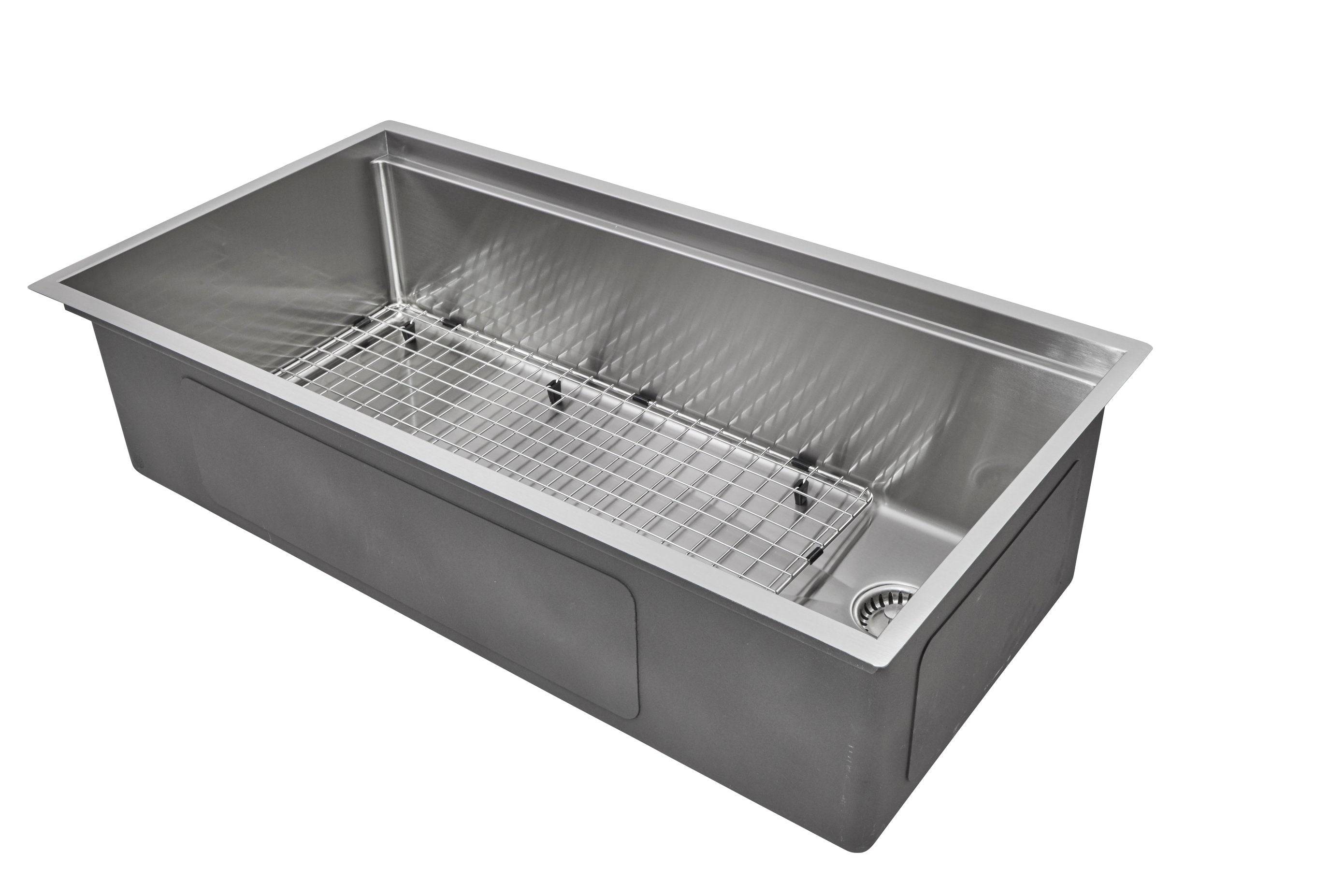 Stainless steel 37-inch workstation kitchen sink with an offset right drain and protective bottom grid. Durable and functional for modern kitchens.