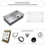 31-inch stainless steal kitchen workstation sink with a custom-fitted sink grid and seamless drain kit, including a C-clamp, rubber mounting seal, drain fitting, strainer basket, and splash guard.