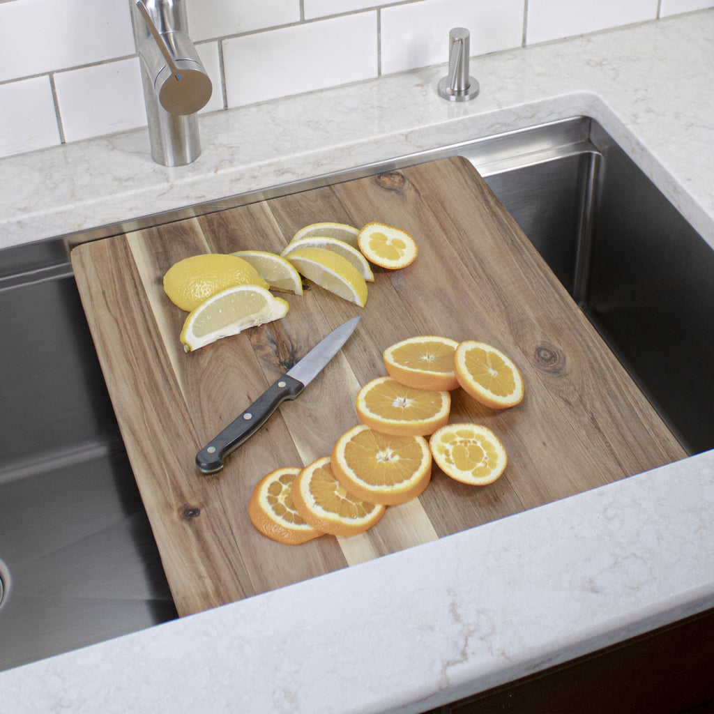 Workstation kitchen sink with edge grain cutting board