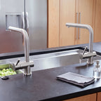 Dual Ardell Stainless Steel Kitchen Faucets installed on a contemporary kitchen island sink, showcasing their modern angular design.