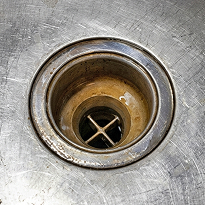 Conventional seamed sink drain compared with the Create Good Sinks seamless drain