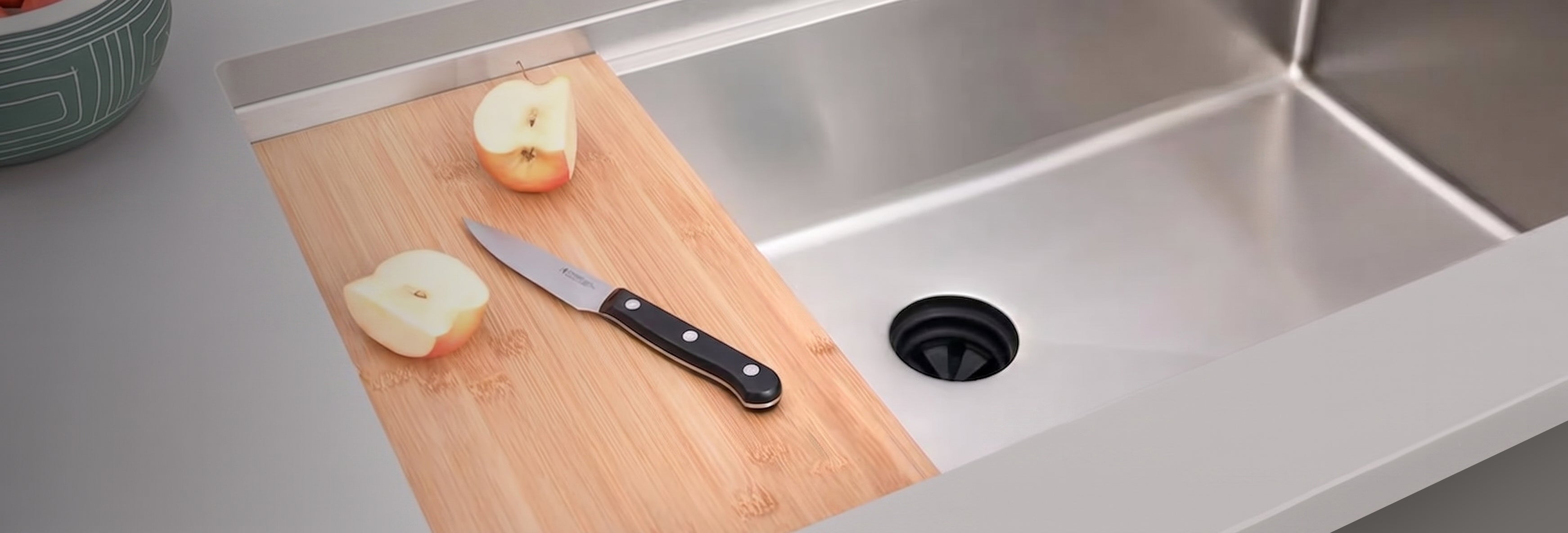 Seamless Centerpiece Drain — basin flows into the drain with no seam