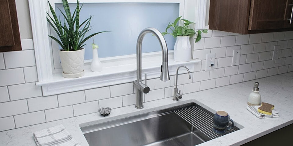 Installing dual kitchen faucets on a large workstation sink