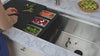 Dual tier large workstation sink has double ledges for sliding sink accessories
