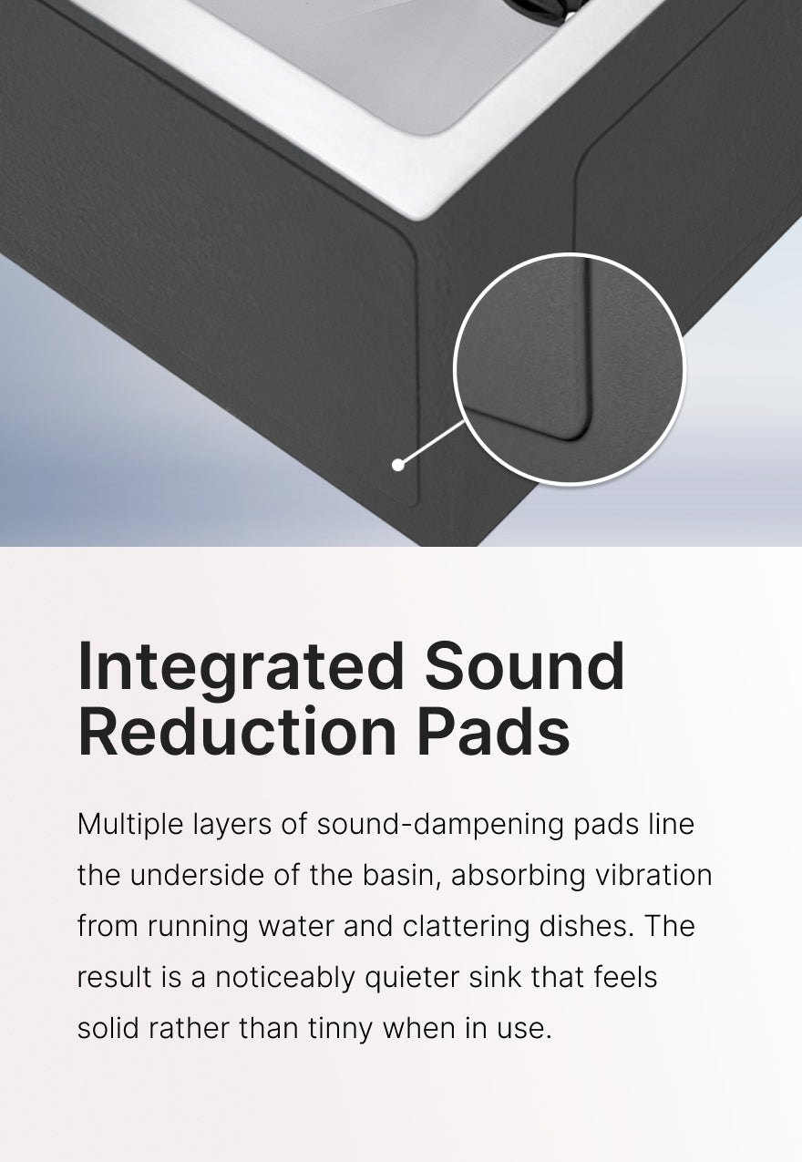 Large sound-absorbing pads on the underside of a stainless steel kitchen sink