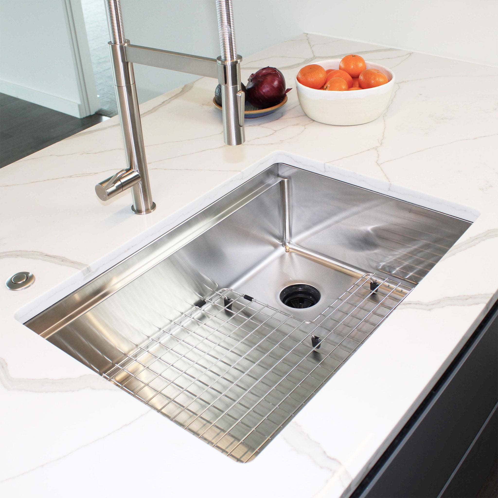 Client submitted photo of the 28” workstation kitchen sink from Create Good with a right, offset seamless drain.