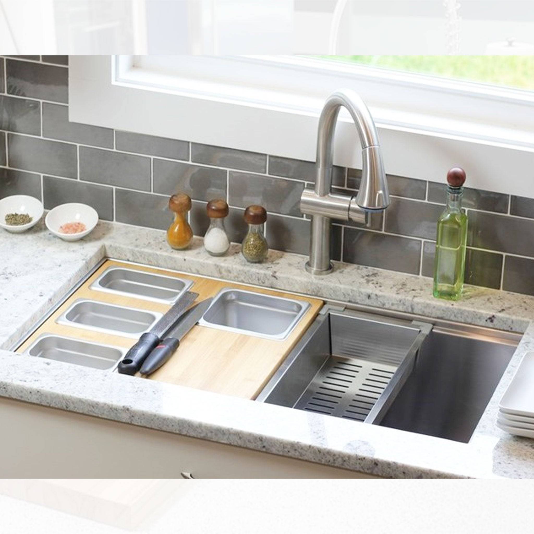 Bamboo 4-Bowl Serving Board and Stainless Steel Colander in a Workstation Kitchen Sink