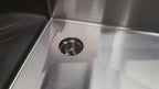 Top view of Seamless Composting Deep Drain Kit in a stainless steel sink, showcasing its sleek design and effective drainage system.