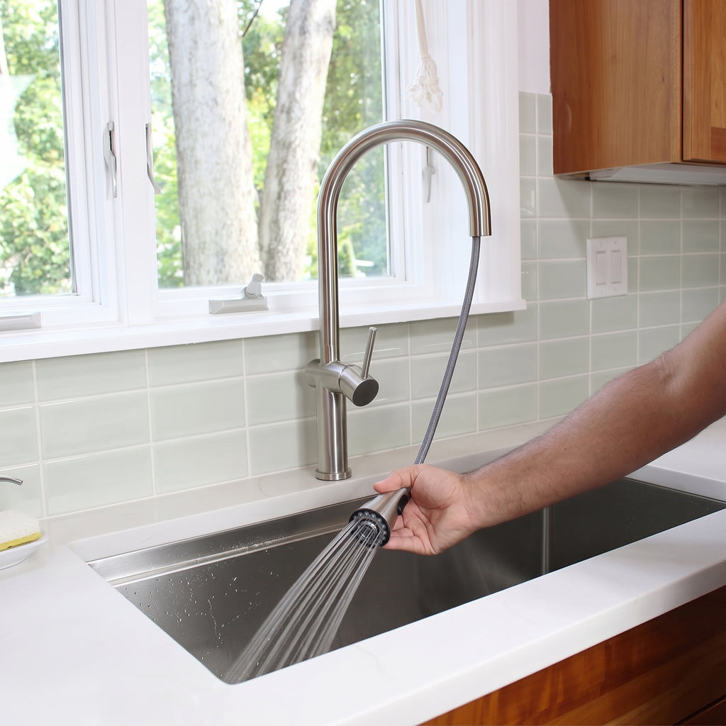 Bella stainless steel kitchen faucet with an extended pull-down hose, providing flexibility for deep sink cleaning and filling large pots.
