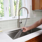 Bella stainless steel kitchen faucet with an extended pull-down hose, providing flexibility for deep sink cleaning and filling large pots.
