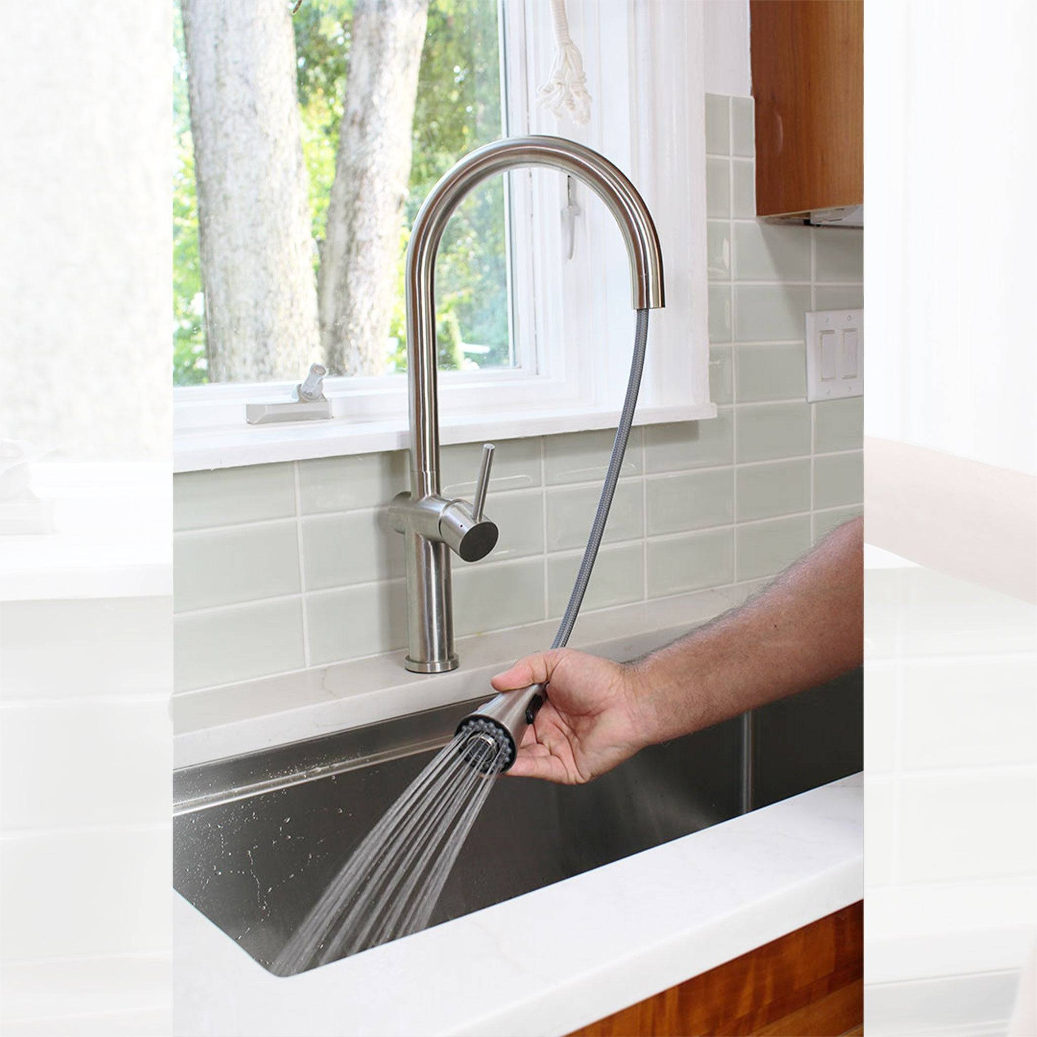 Bella stainless steel kitchen faucet with an extended pull-down hose, providing flexibility for deep sink cleaning and filling large pots.