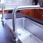 Pair of Ardell Stainless Steel Kitchen Faucets installed on a stylish kitchen sink, highlighting their modern design and durable finish.