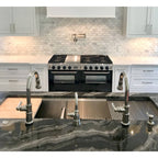 Modern kitchen featuring a 63-inch stainless steel workstation sink with dual faucets and integrated accessories for efficiency.