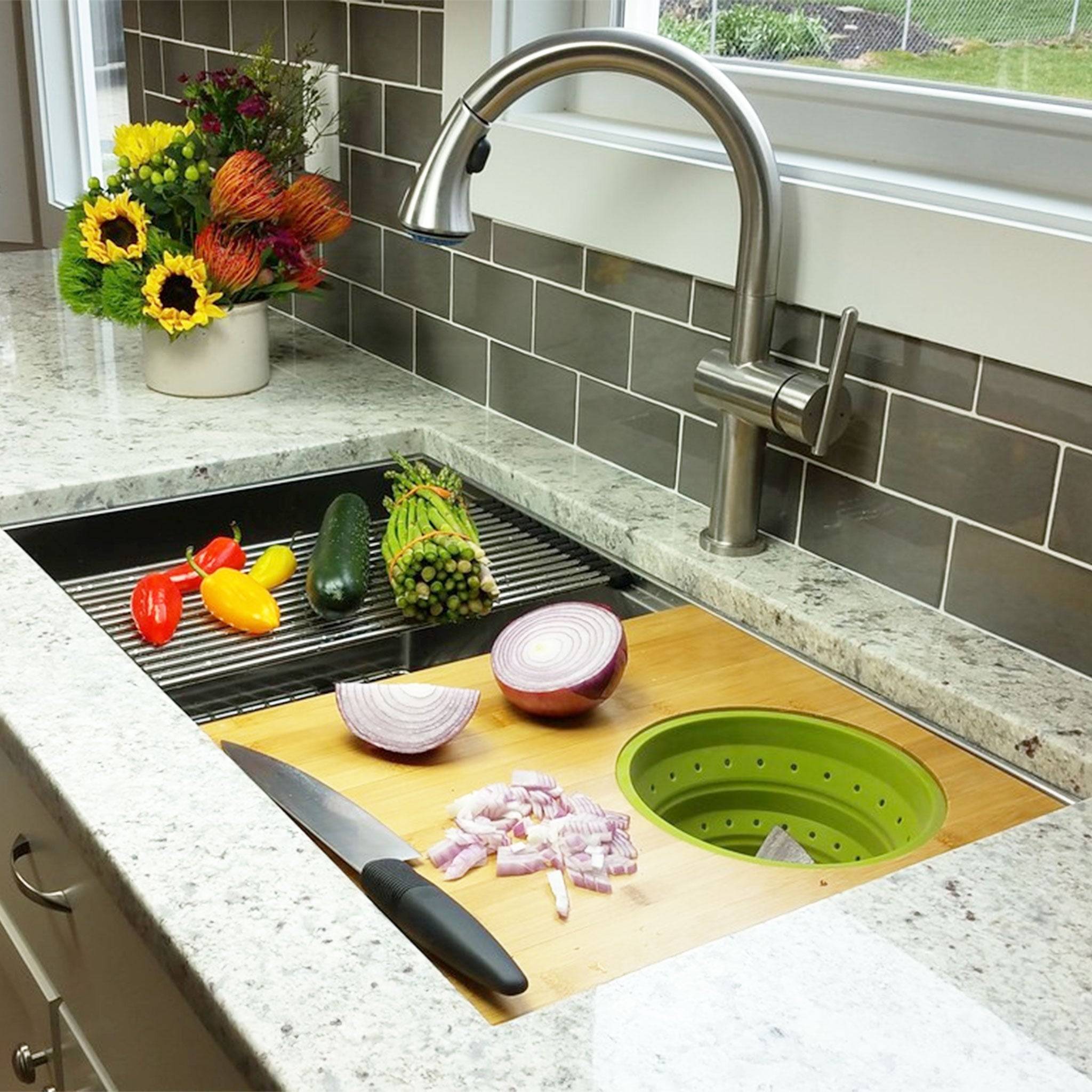 33-inch workstation sink with cutting board and colander accessories. Stainless steel single bowl design enhances food prep and cleanup efficiency.